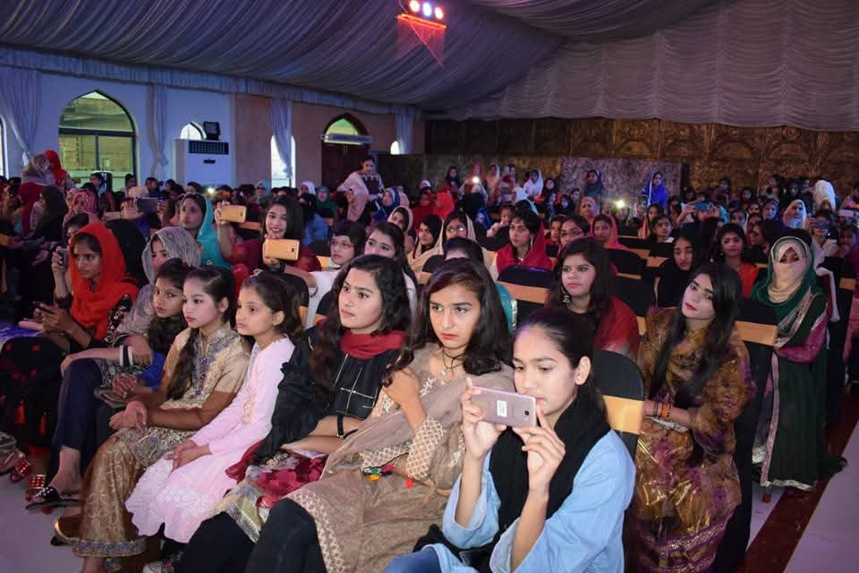 Students seated at an Al-Umar annual ceremony
