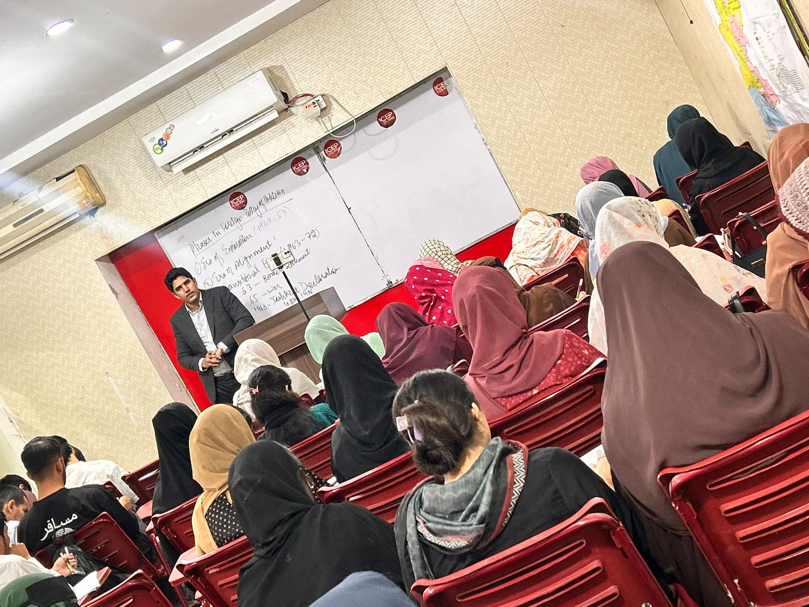 Students taking notes